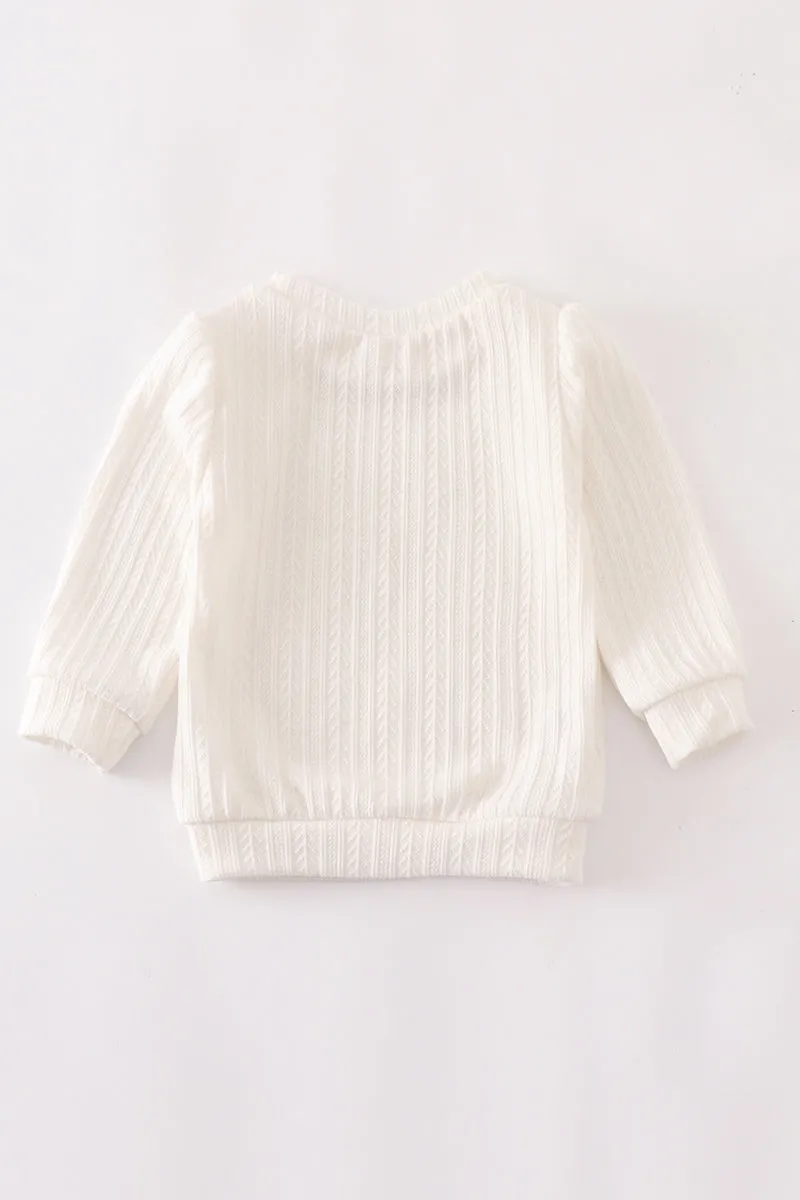 White pullover sweater