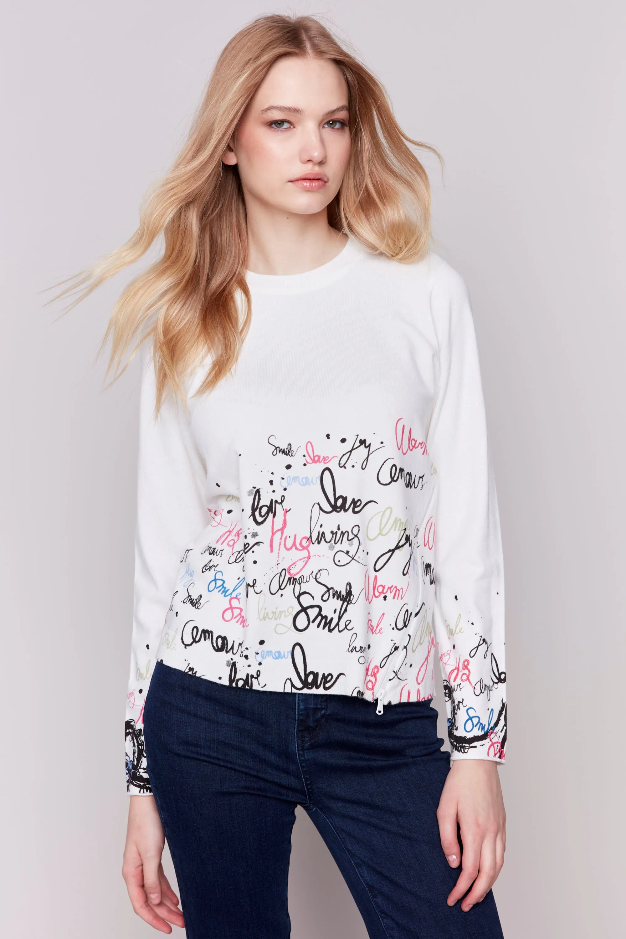 WORD PRINT TOP WITH ZIP HEM